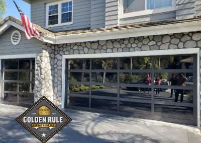 These New Contemporary Glass Aluminum Garage Doors were installed in Trabuco Canyon Ca by Golden Rule Garage Door Inc.