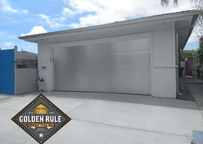 This New Contemporary Glass Aluminum Garage Door was installed in Laguna Niguel Ca by Golden Rule Garage Door Inc.