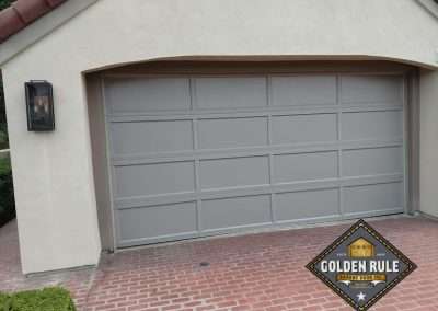 This C.H.I. Recessed Shaker Panel Garage Door in Sandstone was installed in Laguna Hills CA by Golden Rule Garage Door Inc.