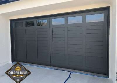 New Custom Wood Carriage House Garage Door installed in Coto de Caza CA by Golden Rule Garage Door Inc. Craftsman Style Paint-grade