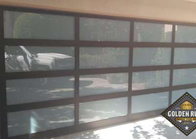 This New Contemporary Glass Aluminum Garage Door was installed in Mission Viejo Ca by Golden Rule Garage Door Inc.