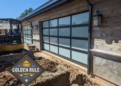 This New Contemporary Glass Aluminum Garage Door was installed in Yorba Linda Ca by Golden Rule Garage Door Inc.