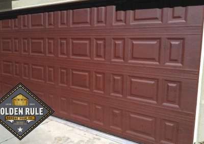 This Unique Traditional Lexington Panel New Garage Door in Dark Finish Wood-Like was installed in Orange County CA by Golden Rule Garage Door Inc.