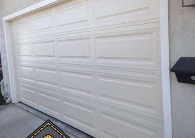 This Unique Traditional Long Panel New Garage Door in Almond was installed in Orange County CA by Golden Rule Garage Door Inc.