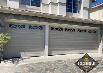 These Unique Traditional Long Panel New Garage Doors in Sandstone with L909 windows were installed in Orange County CA by Golden Rule Garage Door Inc.