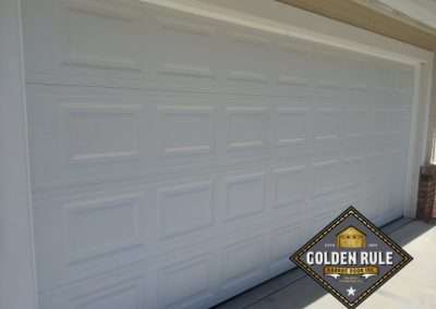This Unique Traditional Short Panel New Garage Door in White was installed in Orange County CA by Golden Rule Garage Door Inc.