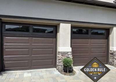 These non-insulated Unique Traditional Long Panel New Garage Doors in Brown with L100 windows were installed in San Clemente CA by Golden Rule Garage Door Inc.